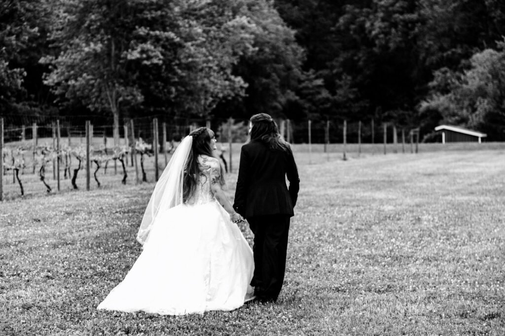Couple in the Vineyards in Shamong, South Jersey at Vineyard Estates for their wedding Day celebration.
